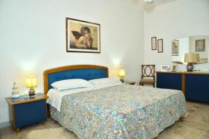 Postel nebo postele na pokoji v ubytování Frisio Reef Apartment- Sea View