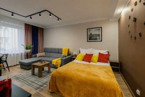 Posteľ alebo postele v izbe v ubytovaní Apartament Pod 13