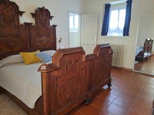 Postel nebo postele na pokoji v ubytování La Cascinetta
