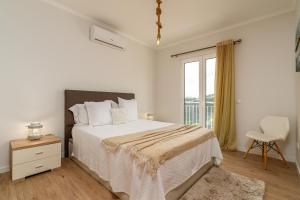 Ένα ή περισσότερα κρεβάτια σε δωμάτιο στο Casa Agrela by Rent2U, Lda Swimming Pool & Jacuzzi +35 φωτογραφίες