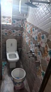 Vonios kambarys apgyvendinimo įstaigoje Lakshman Guest House