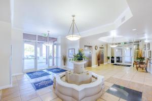 a large living room with a fountain in the middle at Sienna 1103 in Gulfport