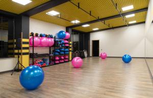 a dance floor with pink and blue balloons in a room at Aquapark Hotel & Villas in Yerevan +87 photos