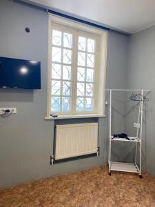TV a/nebo společenská místnost v ubytování Boutique hotel RaqWine + 34 fotografií