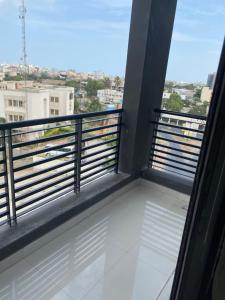 a balcony with a view of a city at Studio meublé in Dakar