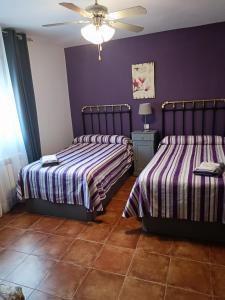 Postel nebo postele na pokoji v ubytování PINAR DE LAS CABAÑUELAS