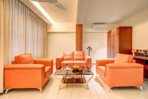 Istumisnurk majutusasutuses Hotel Hari Govindas Mysore - Explore the Heart of Mysore