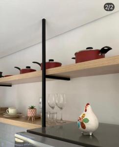 Η κουζίνα ή μικρή κουζίνα στο Espaço Nossa Tiradentes - Loft Encantador 1 +7 φωτογραφίες
