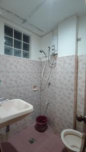 Un baño de R & R (Rest & Relax) Guesthouse