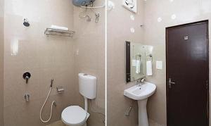 Ванная комната в FabExpress Green Comfort
