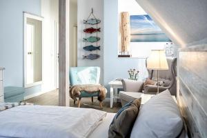 Postel nebo postele na pokoji v ubytování Mein Inselhotel
