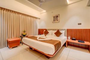 Voodi või voodid majutusasutuse Hotel Hari Govindas Mysore - Explore the Heart of Mysore toas