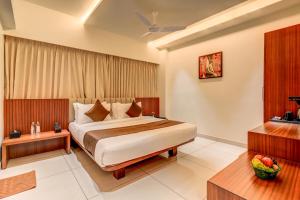 Voodi või voodid majutusasutuse Hotel Hari Govindas Mysore - Explore the Heart of Mysore toas