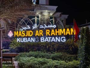 a sign for the masid air rauman kubling balancing at FH Homestay 4BR in Wakaf Baharu