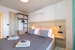 Ένα ή περισσότερα κρεβάτια σε δωμάτιο στο Luxury Apartment Sea View Punat