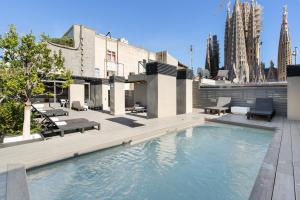a swimming pool on the roof of a building at Sensation Sagrada Familia in Barcelona