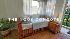 Postel nebo postele na pokoji v ubytování TheNook Condotel