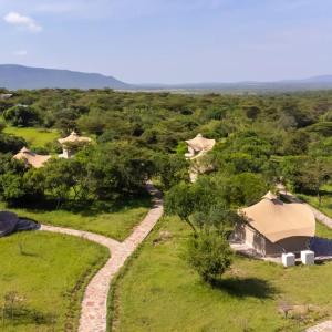 an aerial view of a compound with a road at OLORIEN MARA CAMP in Masai Mara