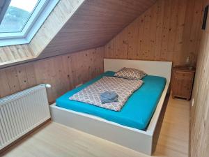 Postel nebo postele na pokoji v ubytování Urlaubstraum