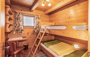 a room with a bunk bed in a log cabin at Ferienhaus In Wagrain in Wagrain