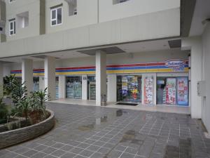 a store front of a shopping center at Aurora Rooms @ Apartemen Loftvilles City in Dukuh