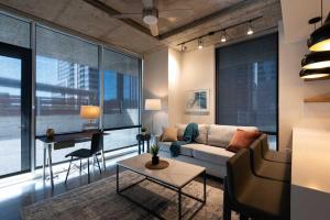 A seating area at Landing Modern Apartment with Amazing Amenities (ID6221)