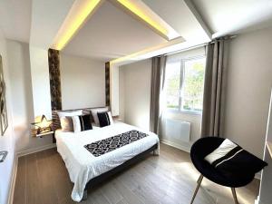 Les Fontaines d'O客房内的一张或多张床位
