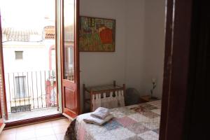 Posteľ alebo postele v izbe v ubytovaní Preciosa vivienda enorme y totalmente equipada en el centro de Figueres