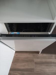 a stove top oven sitting on top of a counter at Francos Rodriguez1 Apartments in Madrid