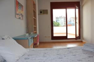 Posteľ alebo postele v izbe v ubytovaní Preciosa vivienda enorme y totalmente equipada en el centro de Figueres