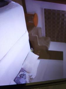 Una cama o camas en una habitación de Sanzak hotel and apartments