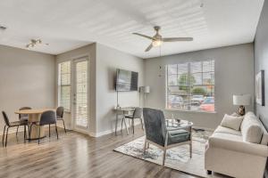 a living room with a couch and a table at Landing Modern Apartment with Amazing Amenities (ID5692X84) in Tampa