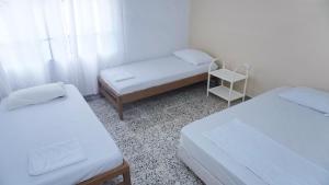 Ένα ή περισσότερα κρεβάτια σε δωμάτιο στο Cabaña La Pereztroica 2 +5 φωτογραφίες