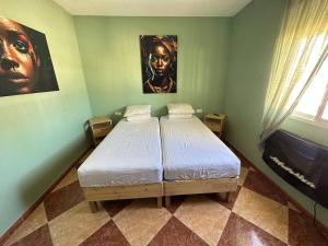 Postel nebo postele na pokoji v ubytování Moto Vila Groot