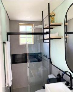 Ένα μπάνιο στο Espaço Nossa Tiradentes - Loft Aconchegante 2