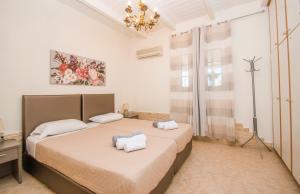 Postel nebo postele na pokoji v ubytování Zante Sunny Villa I + 26 fotografií