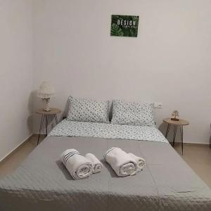 Кровать или кровати в номере Creta Irini's Rooms3