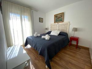 Ein Bett oder Betten in einem Zimmer der Unterkunft 501 - Ap. Cant del Ocells