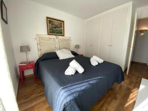Ein Bett oder Betten in einem Zimmer der Unterkunft 501 - Ap. Cant del Ocells