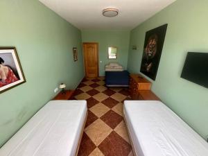Postel nebo postele na pokoji v ubytování Moto Vila Groot