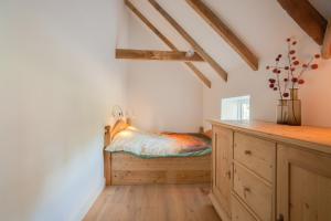 Een bed of bedden in een kamer bij Logies Groot Okhorst