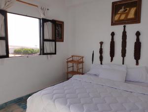 Riad & Restaurant Ocean Beach Douira客房内的一张或多张床位
