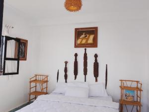 Riad & Restaurant Ocean Beach Douira客房内的一张或多张床位