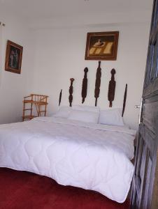 Riad & Restaurant Ocean Beach Douira客房内的一张或多张床位