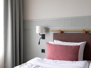 Postel nebo postele na pokoji v ubytování Elite Palace Hotel & Spa