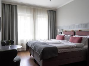 Postel nebo postele na pokoji v ubytování Elite Palace Hotel & Spa