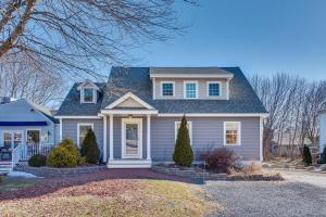 a gray house with a blue roof at Downtown Ogunquit Home 1 Mi to Beach! in Ogunquit