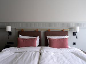 Postel nebo postele na pokoji v ubytování Elite Palace Hotel & Spa