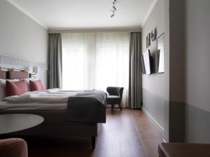 Postel nebo postele na pokoji v ubytování Elite Palace Hotel & Spa