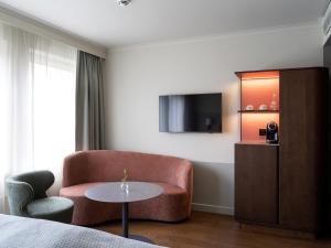 TV a/nebo společenská místnost v ubytování Elite Palace Hotel & Spa